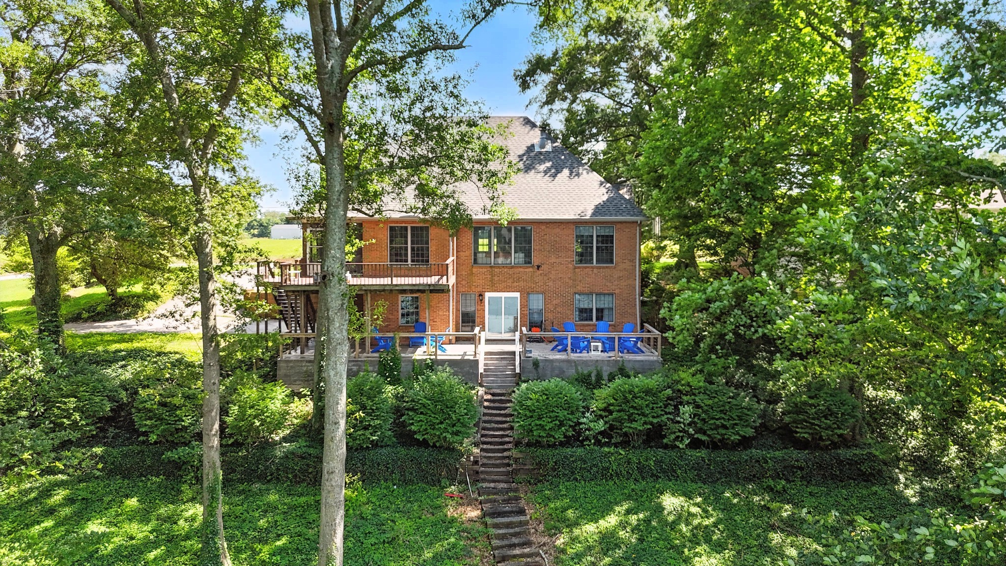 208 Loop Drive Winchester, TN 37398 - Photo 11 of 88 a view of a house with a yard and potted plants