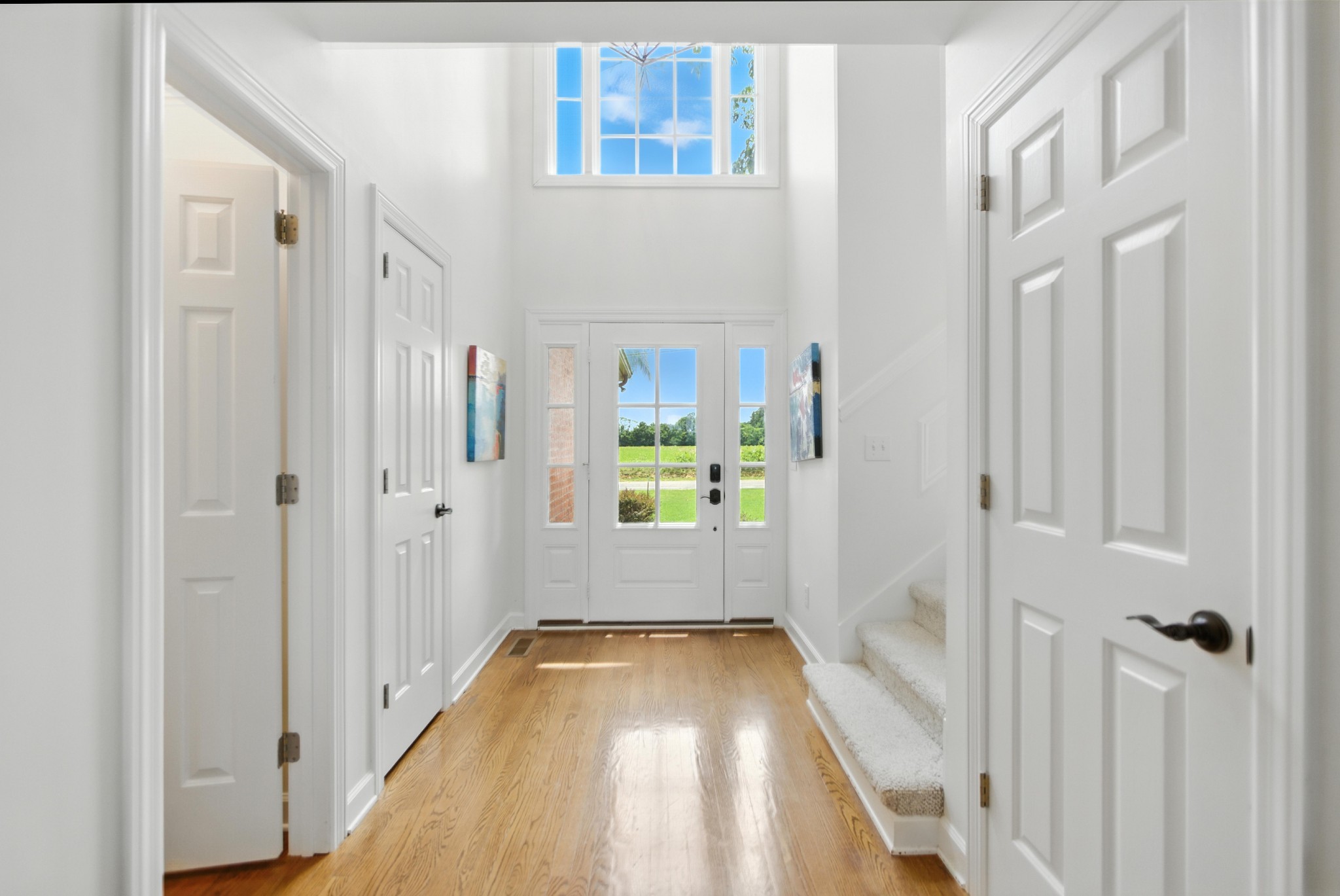 208 Loop Drive Winchester, TN 37398 - Photo 15 of 88 a view of a hallway with wooden floor and staircase