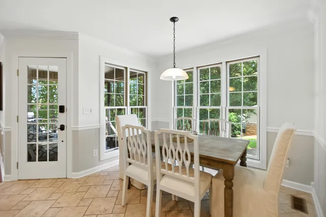 a bedroom with a bed and a hallway
