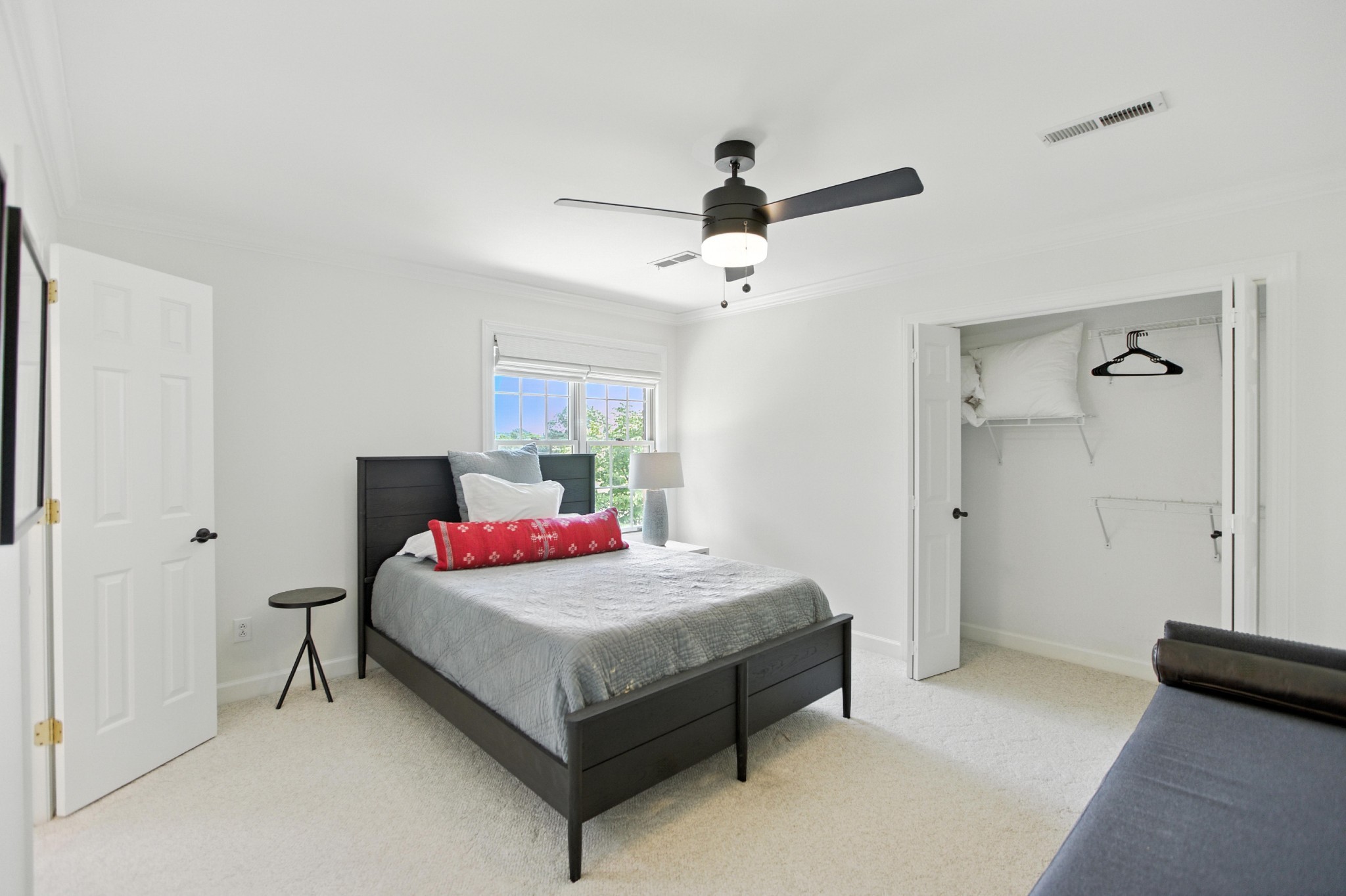 208 Loop Drive Winchester, TN 37398 - Photo 57 of 88 a bedroom with a bed and a chandelier