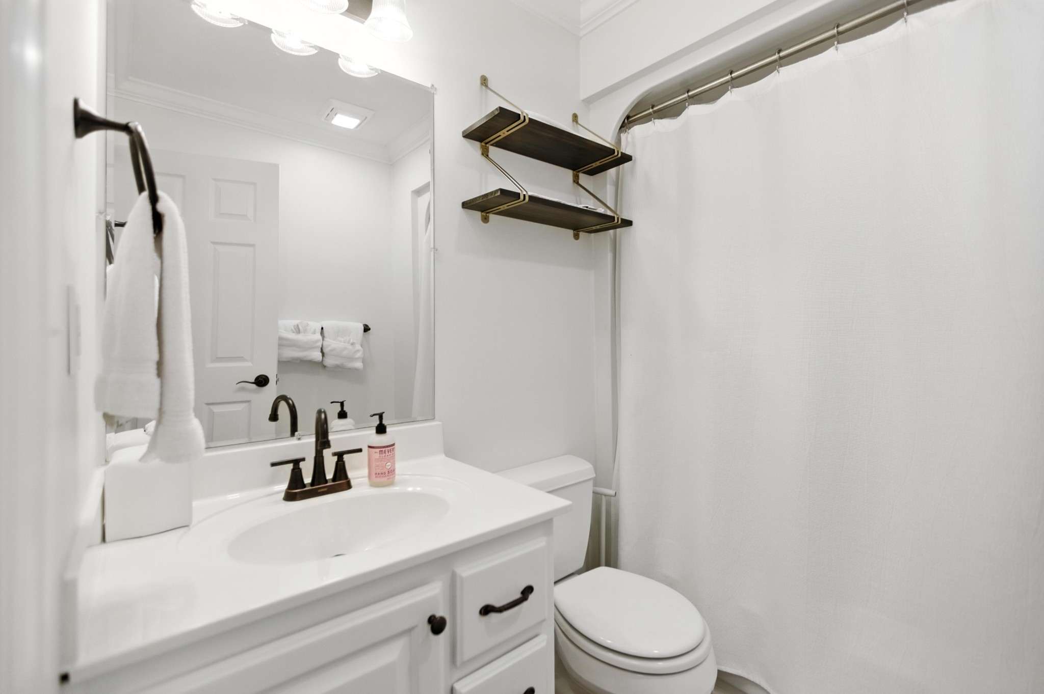 208 Loop Drive Winchester, TN 37398 - Photo 65 of 88 a bathroom with a sink vanity mirror and toilet