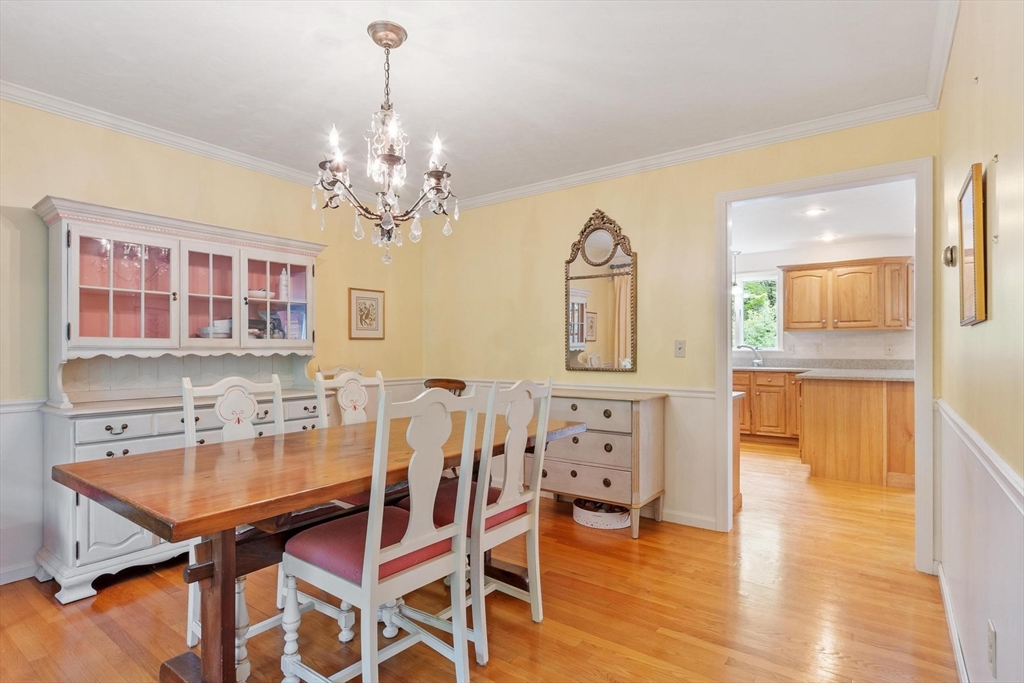 94 Turner Road Townsend, MA 01469 - Photo 4 of 42 a view of a dining room with furniture and wooden floor