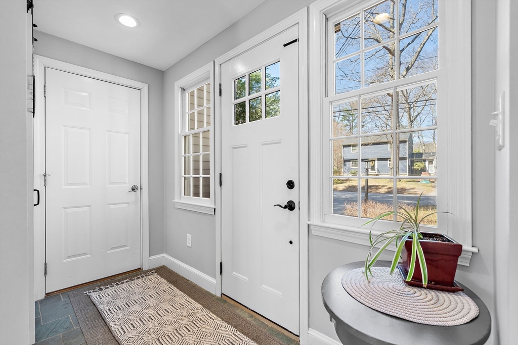13 Mohegan Road Acton, MA 01720 - Photo 4 of 39 a living room with furniture and a window