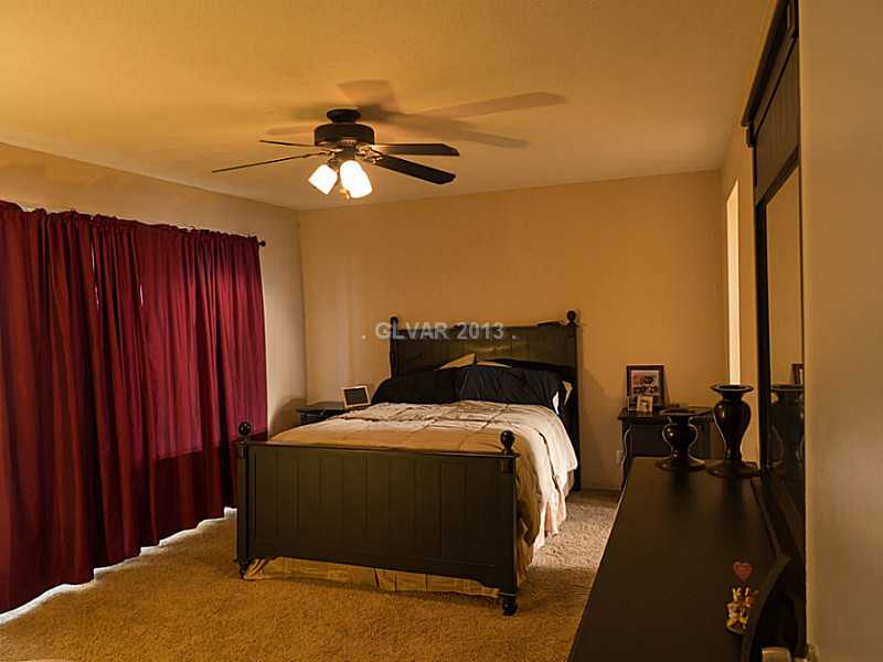 3129 South Topaz Road Las Vegas, NV 89121 - Photo 16 of 23 Property Photo. The Master Bedroom, Complete With Balcony