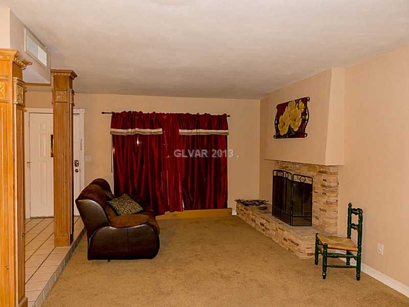 3129 South Topaz Road Las Vegas, NV 89121 - Photo 4 of 23 Property Photo. Custom Woodwork Perfectly Appoints Your New Home s Sunken Living Room.