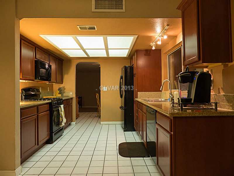 3129 South Topaz Road Las Vegas, NV 89121 - Photo 5 of 23 Property Photo. A Completely New Kitchen Complete With Granite Counters & Custom Cabinets Make Entertaining In This Las Vegas Classics Home A Pleasure!