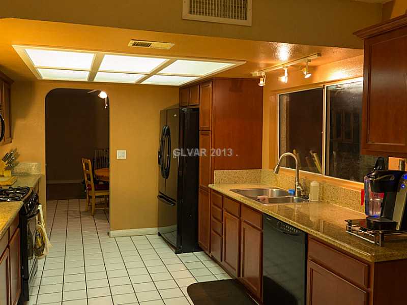 3129 South Topaz Road Las Vegas, NV 89121 - Photo 7 of 23 Property Photo. Top Of The Line Fixtures Adorn This Gorgeous Kitchen