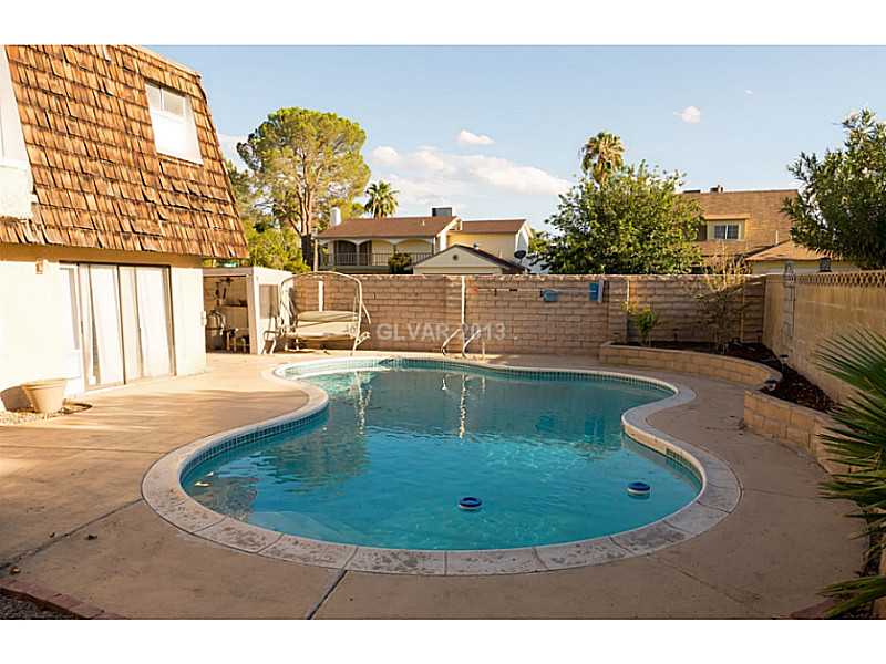 3129 South Topaz Road Las Vegas, NV 89121 - Photo 10 of 23 Property Photo. Huge "Kidney Bean" Pool Are One Of The Many Bonuses of This Fantastic Home!