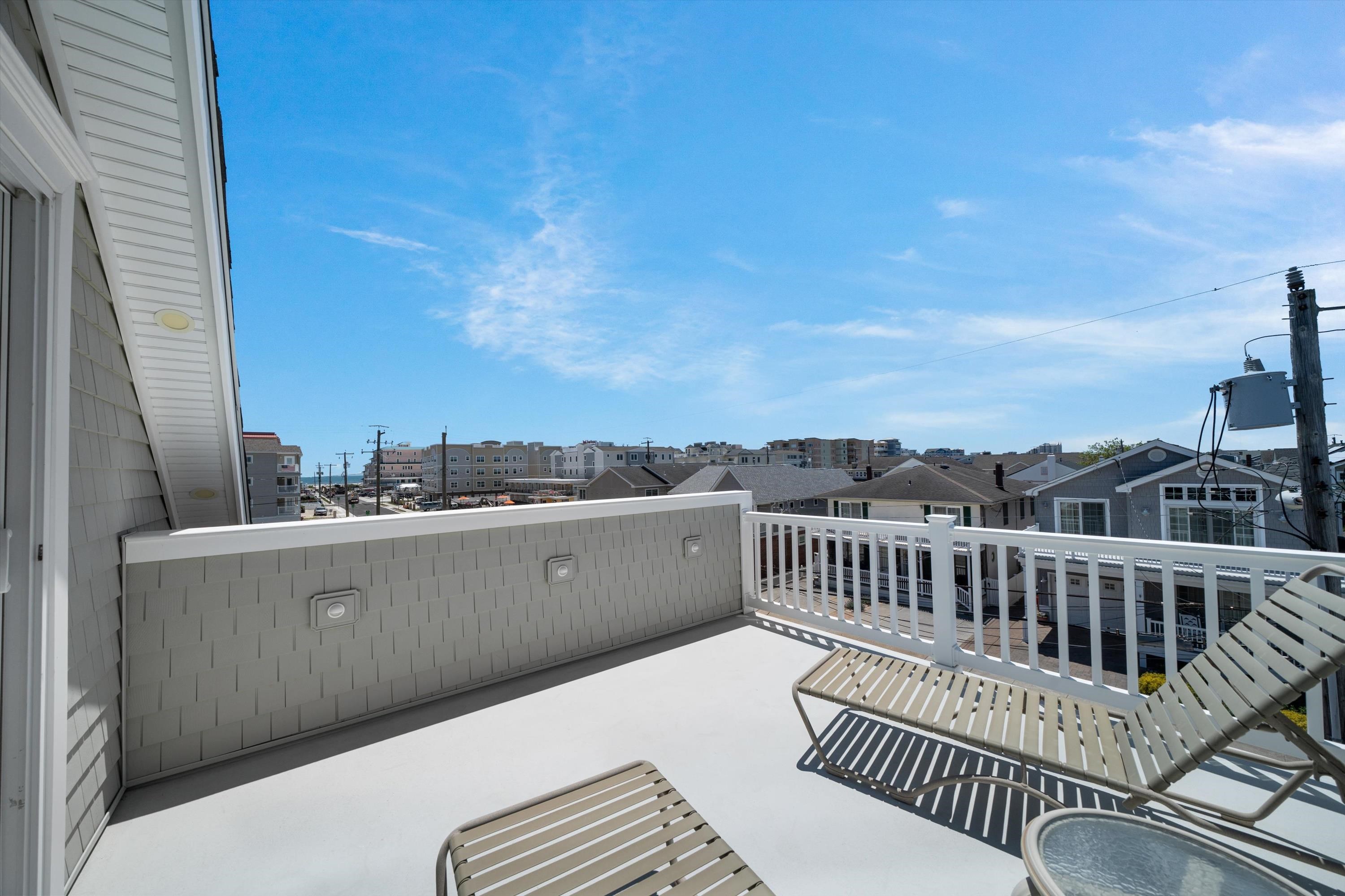 305 East Stockton Road Wildwood Crest, NJ 08260 - Photo 25 of 28 a view of a chair in the roof deck