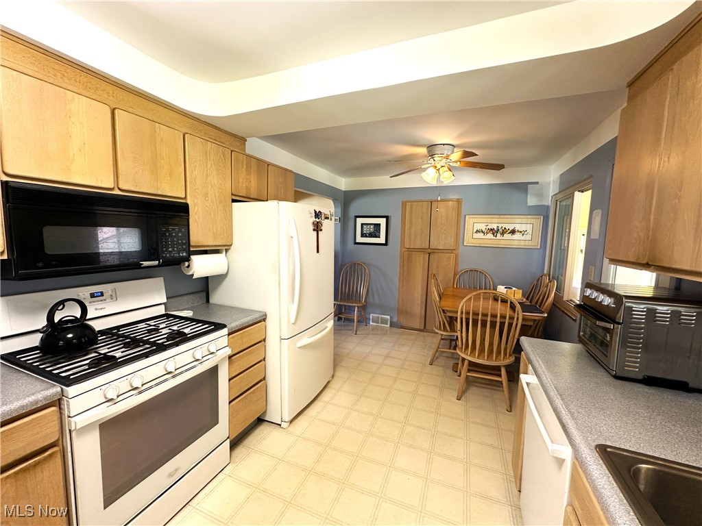 4099 Chestnut Road Independence, OH 44131 - Photo 16 of 37 range, microwave, & refrigerator all stay