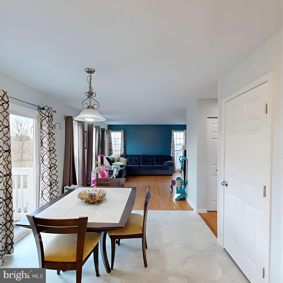 110 Trafford Drive Chestertown, MD 21620 - Photo 8 of 26 a view of a dining room with furniture window and wooden floor