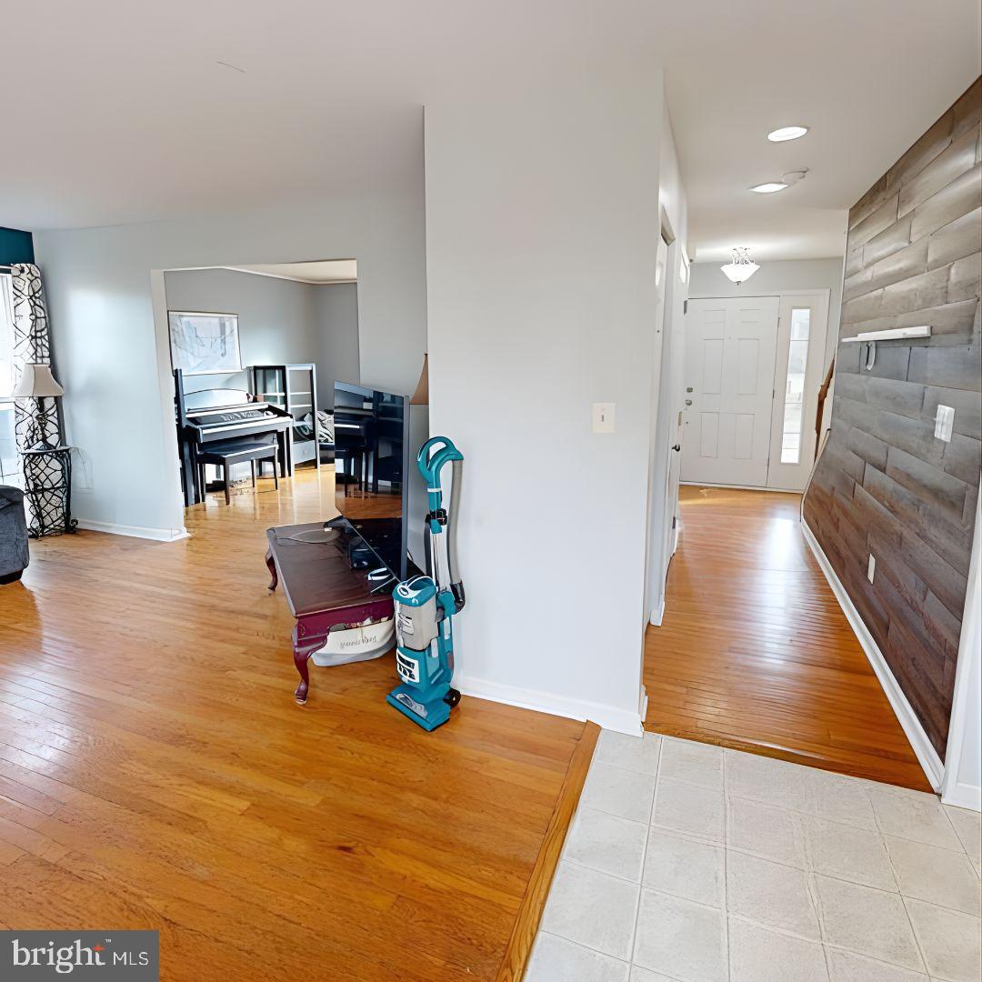 110 Trafford Drive Chestertown, MD 21620 - Photo 9 of 26 a living room with furniture and a wooden floor