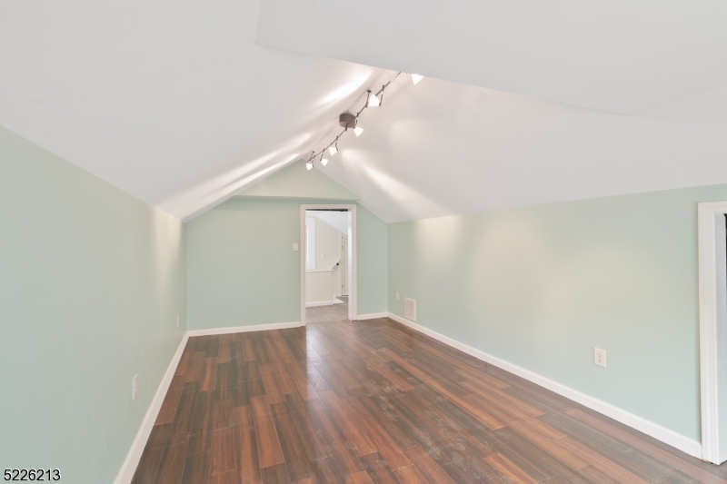 21 Ledgewood Avenue Netcong, NJ 07857 - Photo 17 of 25 a view of an empty room with wooden floor