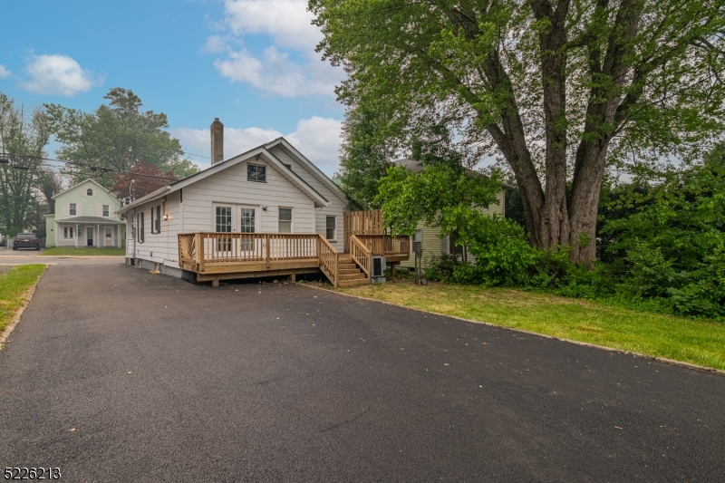 21 Ledgewood Avenue Netcong, NJ 07857 - Photo 25 of 25 a front view of a house with a yard and trees