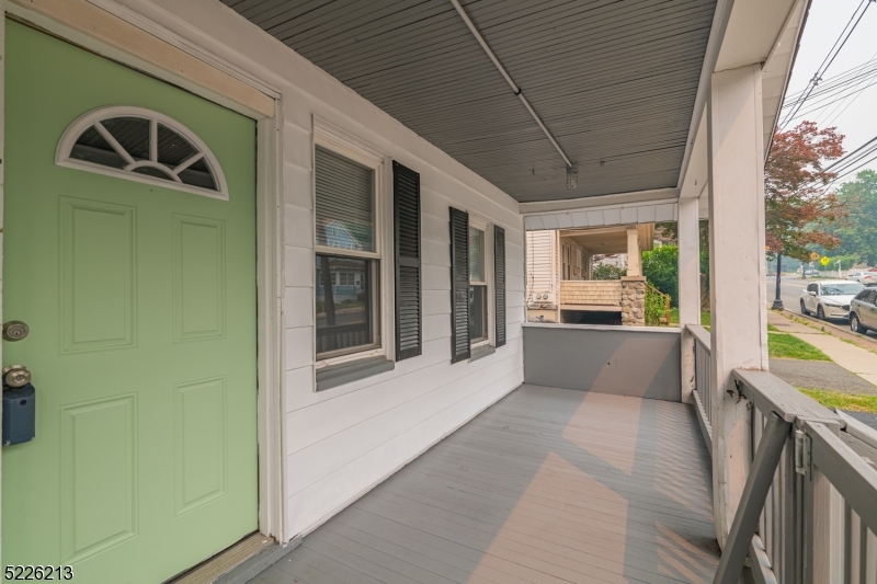 21 Ledgewood Avenue Netcong, NJ 07857 - Photo 5 of 25 a view of a hallway with a tub and chandelier