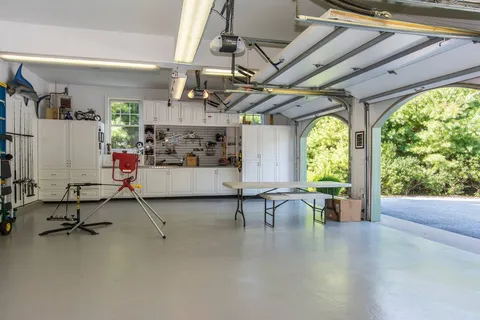 a view of a livingroom with furniture and a window