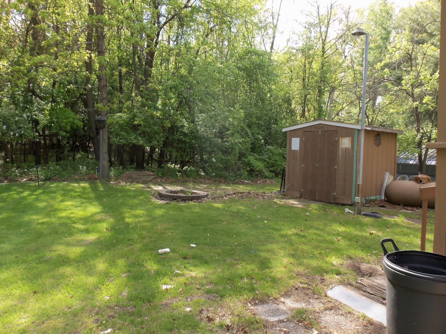 21-216 Woodhaven Sublette, IL 61367 - Photo 7 of 23 a backyard of a house with seating space
