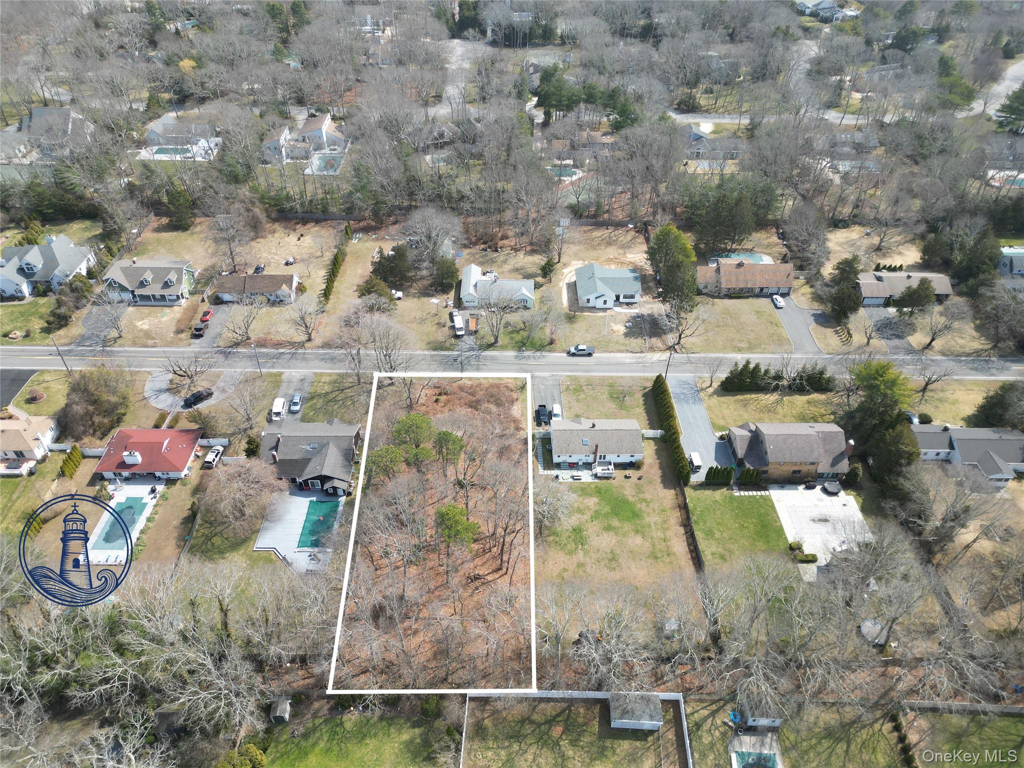 17 Nidzyn Avenue Remsenburg, NY 11960 - Photo 3 of 5 an aerial view of residential houses with outdoor space