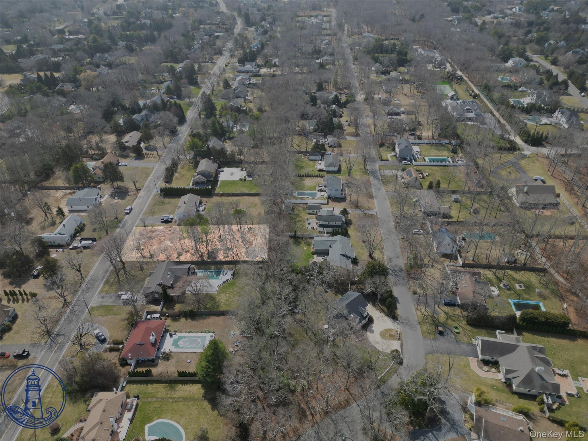 17 Nidzyn Avenue Remsenburg, NY 11960 - Photo 5 of 5 a aerial view of a house with a yard