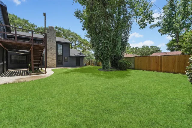 a view of a backyard with a garden