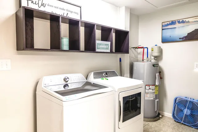a view of a bathroom with a sink and a shower