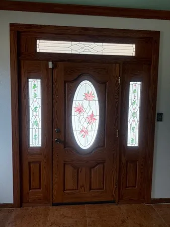 a close view of fireplace with wooden door