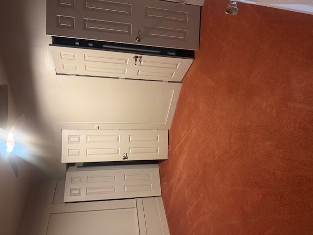 600 South Pecan Avenue Luling, TX 78648 - Photo 7 of 18 an empty room with a refrigerator