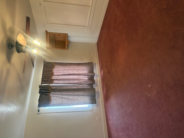 600 South Pecan Avenue Luling, TX 78648 - Photo 9 of 18 a view of wooden floor and window in a room