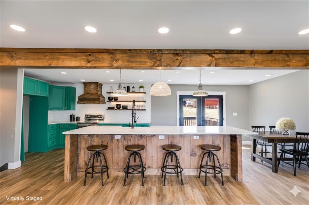 118 Raven Road Villa Rica, GA 30180 - Photo 20 of 50 a view of a dining room with furniture and wooden floor