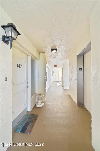 a view of a room with an empty space