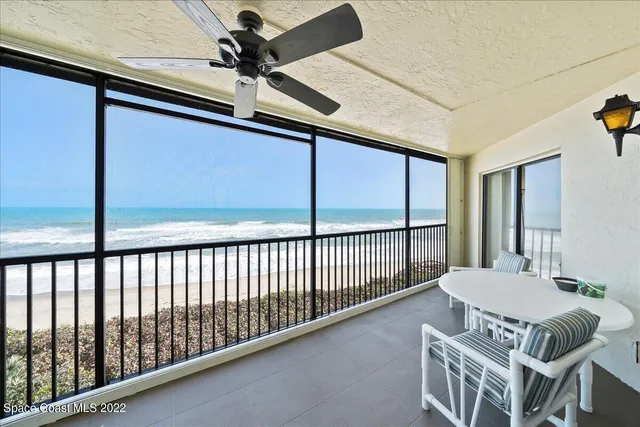 a view of a balcony dining area