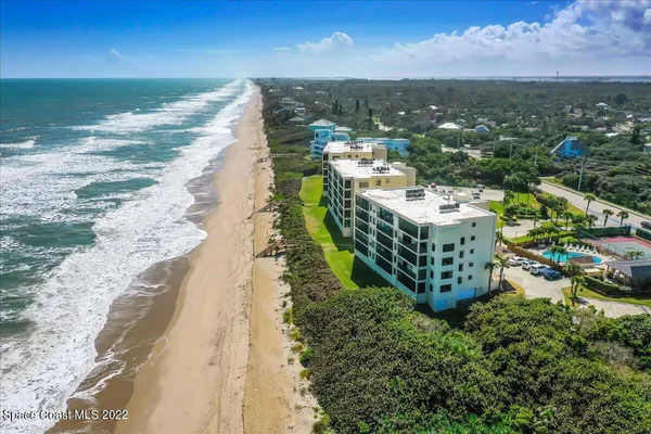 a view of a city with lawn chairs