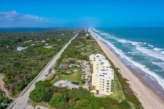 a view of a balcony with an ocean