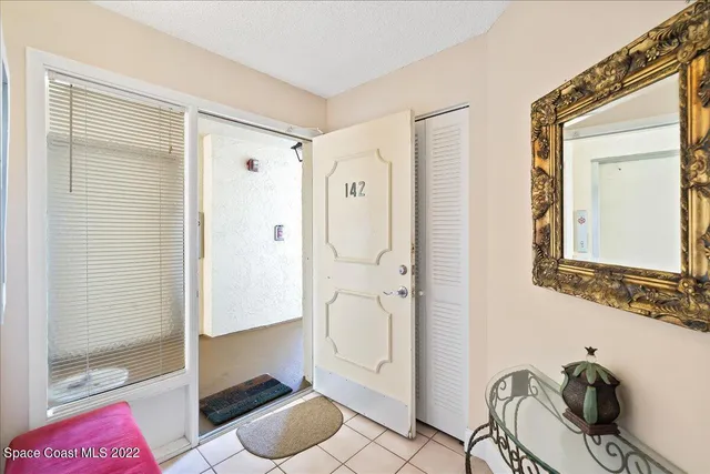 a bathroom with a shower and a sink