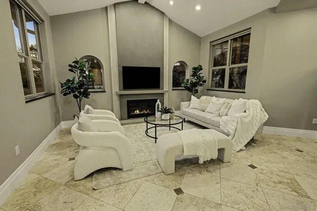 a living room with patio furniture