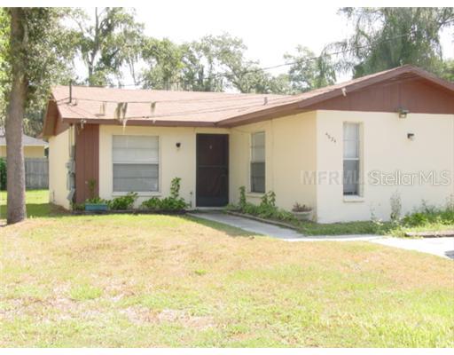 4634 Dail Road Lakeland, FL 33813 - Photo 1 of 1 a view of a white house with a outdoor space