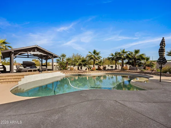 a view of a house with a swimming pool