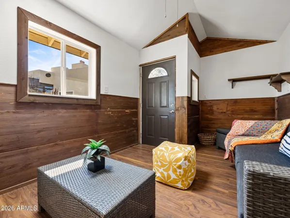 an aerial view of a house with a lake view