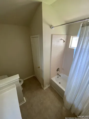 a bathroom with a sink and a toilet