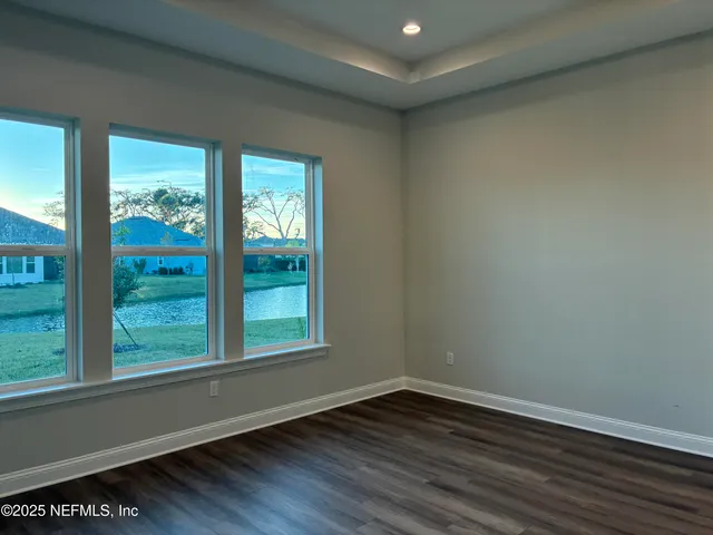 a view of a lake with a big yard