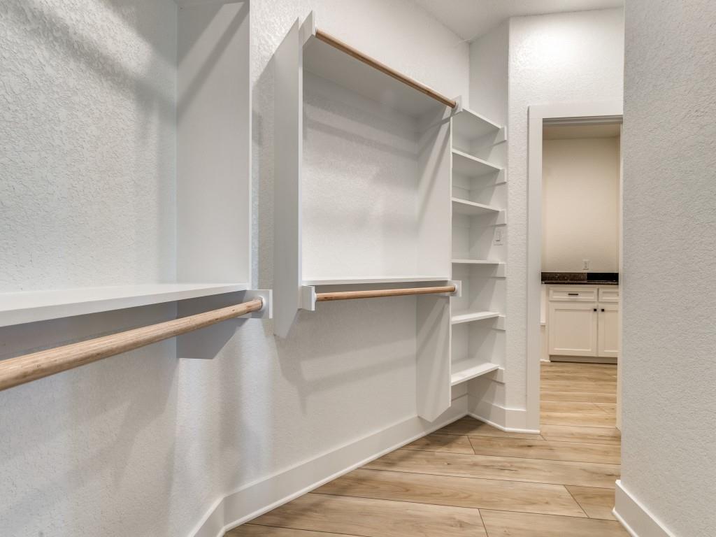 300 County Road 3141 Decatur, TX 76234 - Photo 15 of 25 a view of walk in closet with empty racks