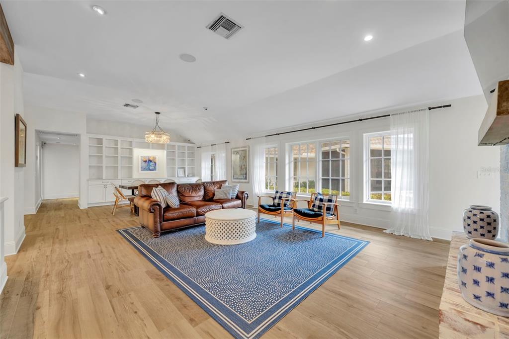 700 Pinetree Road Winter Park, FL 32789 - Photo 12 of 58 a living room with furniture and wooden floor