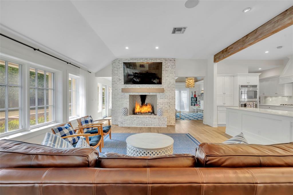700 Pinetree Road Winter Park, FL 32789 - Photo 13 of 58 a living room with furniture and a flat screen tv