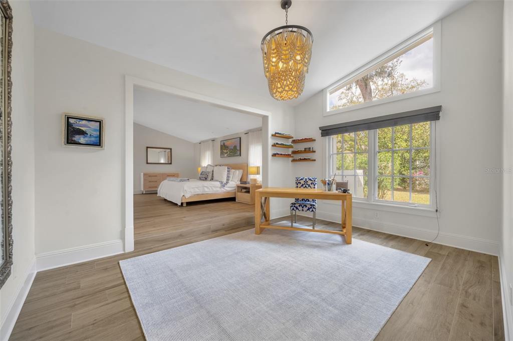 700 Pinetree Road Winter Park, FL 32789 - Photo 26 of 58 a view of a livingroom with furniture and a window