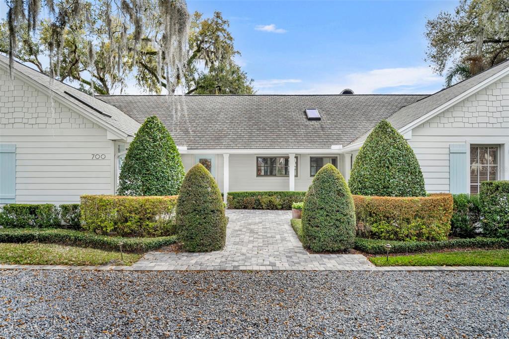 700 Pinetree Road Winter Park, FL 32789 - Photo 4 of 58 a view of a back yard of the house