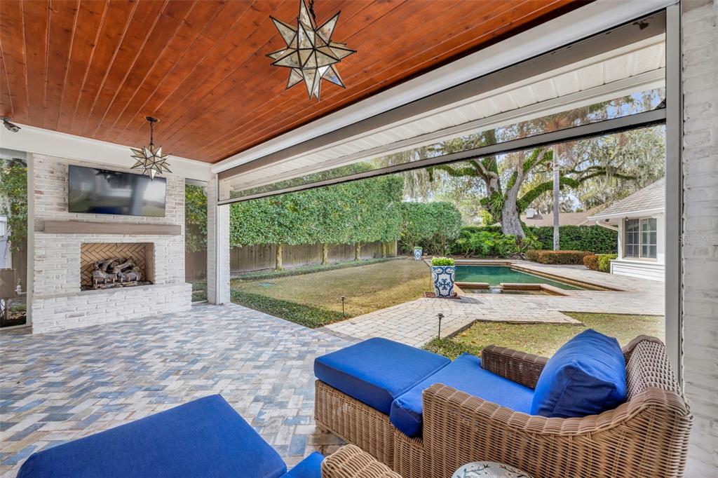 700 Pinetree Road Winter Park, FL 32789 - Photo 47 of 58 a view of a livingroom with furniture window and a fireplace