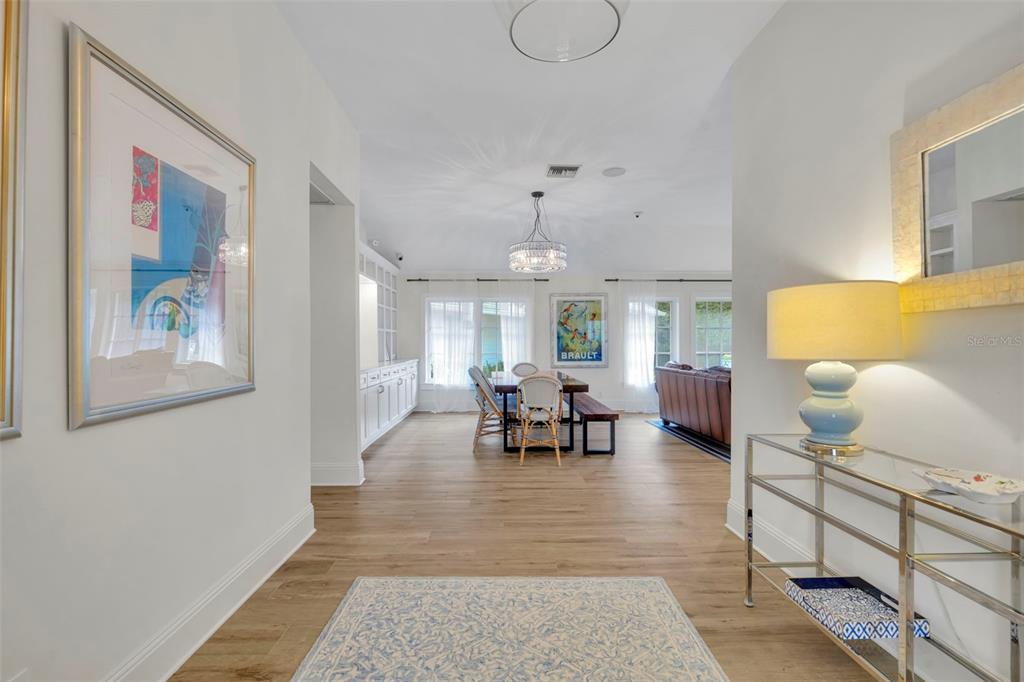 700 Pinetree Road Winter Park, FL 32789 - Photo 5 of 58 a living room with furniture and a chandelier