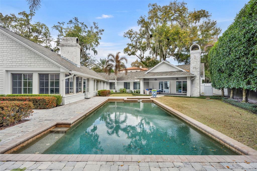 700 Pinetree Road Winter Park, FL 32789 - Photo 51 of 58 a view of a house with swimming pool