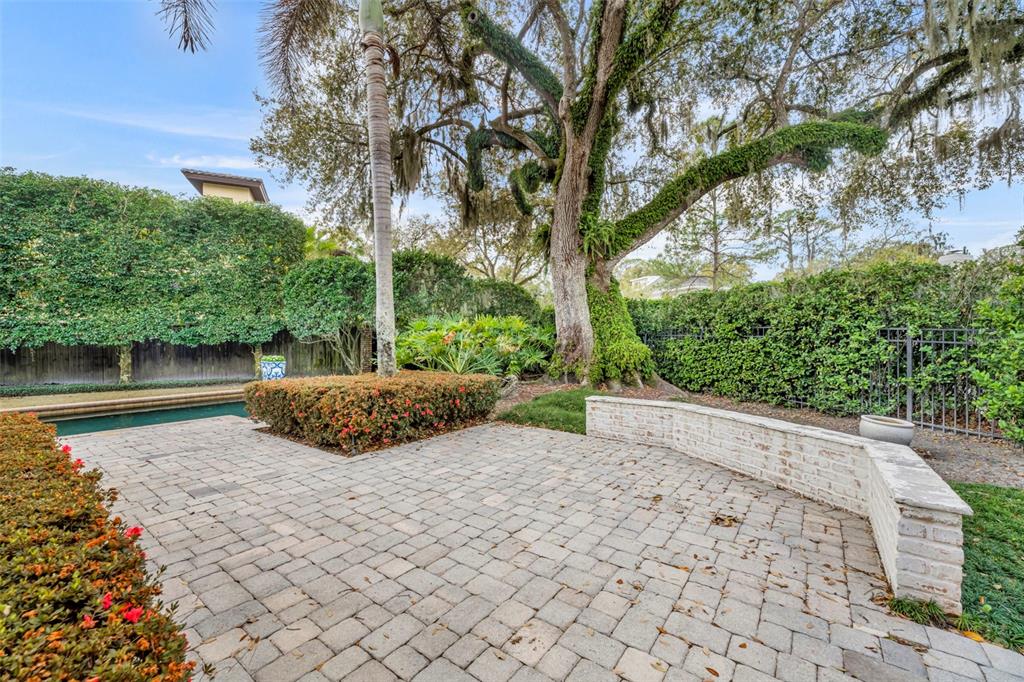 700 Pinetree Road Winter Park, FL 32789 - Photo 54 of 58 a view of a backyard with a garden