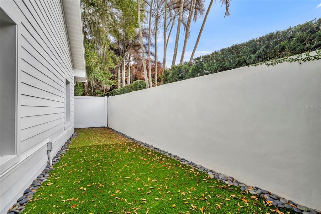 700 Pinetree Road Winter Park, FL 32789 - Photo 55 of 58 a view of a yard with plants